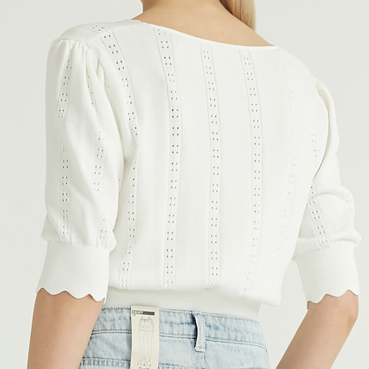 Pull à col en V blanc à motif creux pour femme