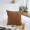 Housse de coussin en tricot épais 100 % coton.